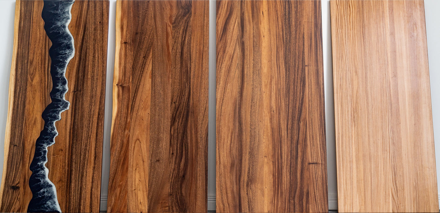 Four solid wood tops are put together for a photo shot, showcasing their aesthetic.
